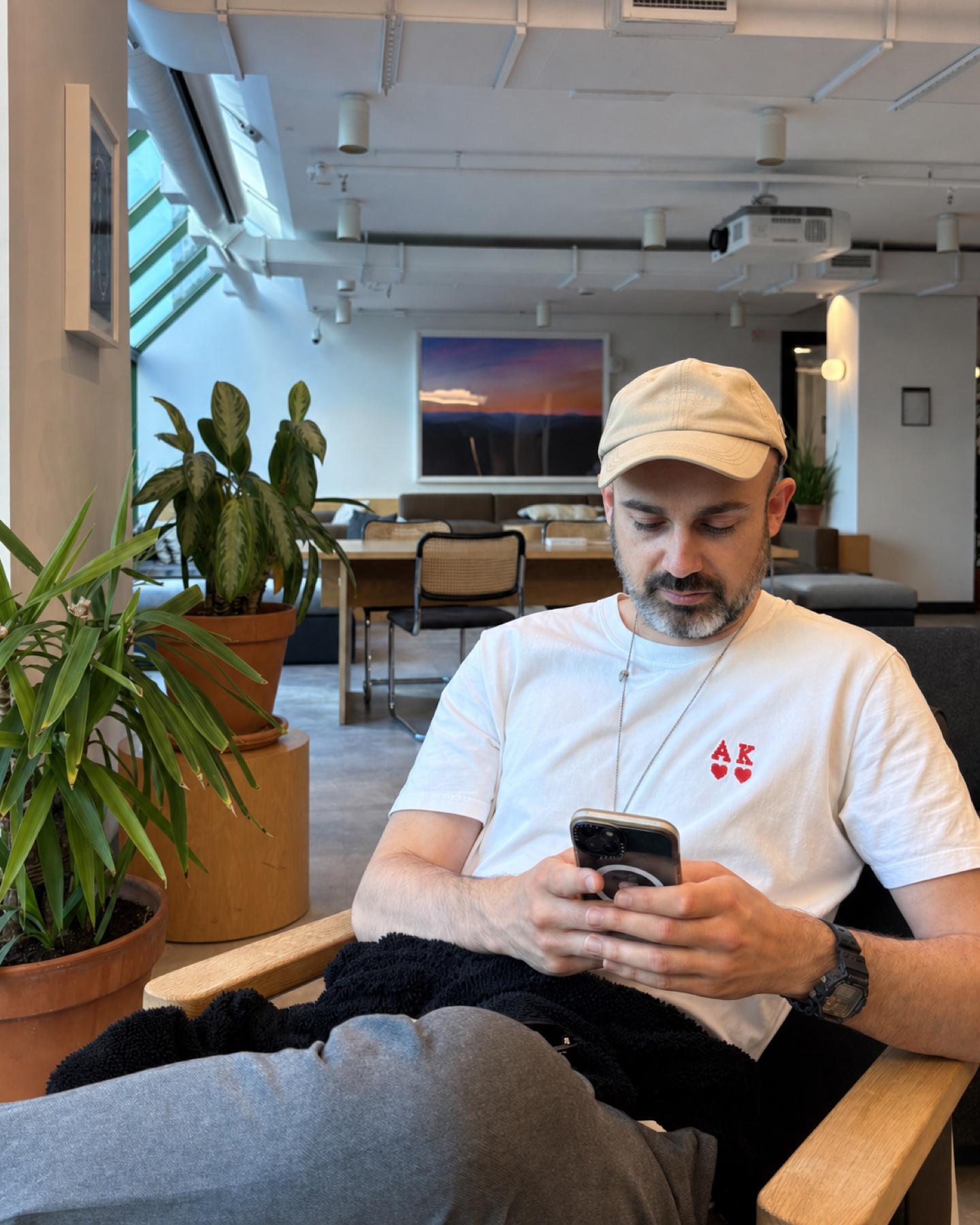 Samuel Benainous working in a contemporary office